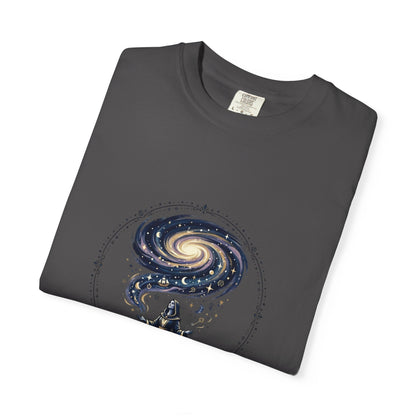 Magic Believe T‑Shirt — Wizard Gazing at Galaxy with "Magic is not about tricks or spells; it's about believing in the impossible" Quote