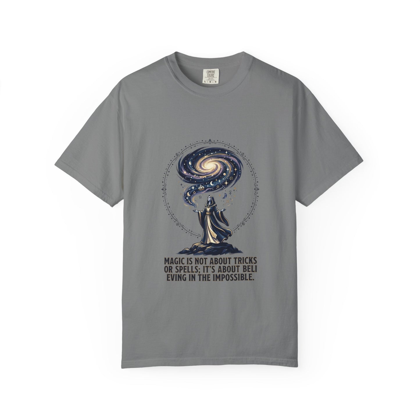 Magic Believe T‑Shirt — Wizard Gazing at Galaxy with "Magic is not about tricks or spells; it's about believing in the impossible" Quote