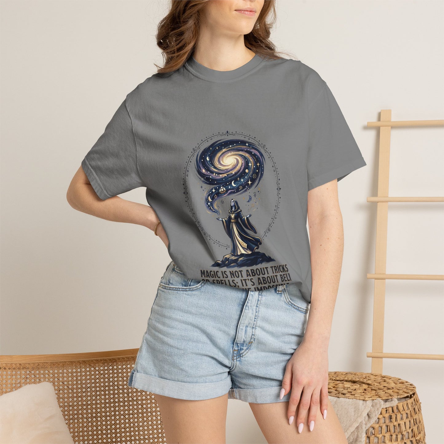 Magic Believe T‑Shirt — Wizard Gazing at Galaxy with "Magic is not about tricks or spells; it's about believing in the impossible" Quote