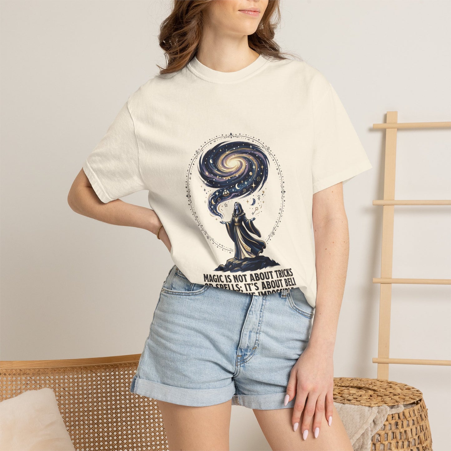 Magic Believe T‑Shirt — Wizard Gazing at Galaxy with "Magic is not about tricks or spells; it's about believing in the impossible" Quote