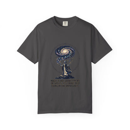 Magic Believe T‑Shirt — Wizard Gazing at Galaxy with "Magic is not about tricks or spells; it's about believing in the impossible" Quote