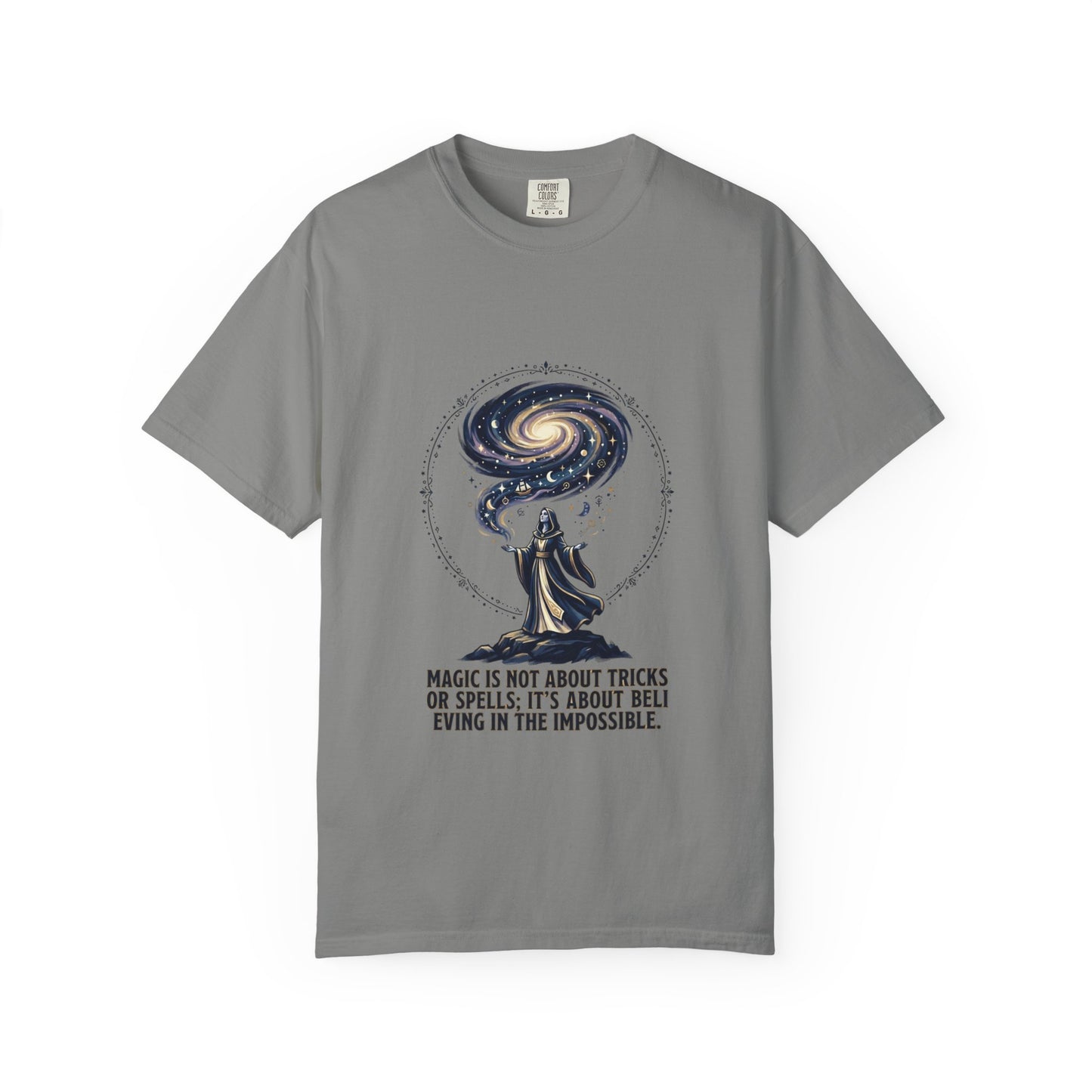 Magic Believe T‑Shirt — Wizard Gazing at Galaxy with "Magic is not about tricks or spells; it's about believing in the impossible" Quote