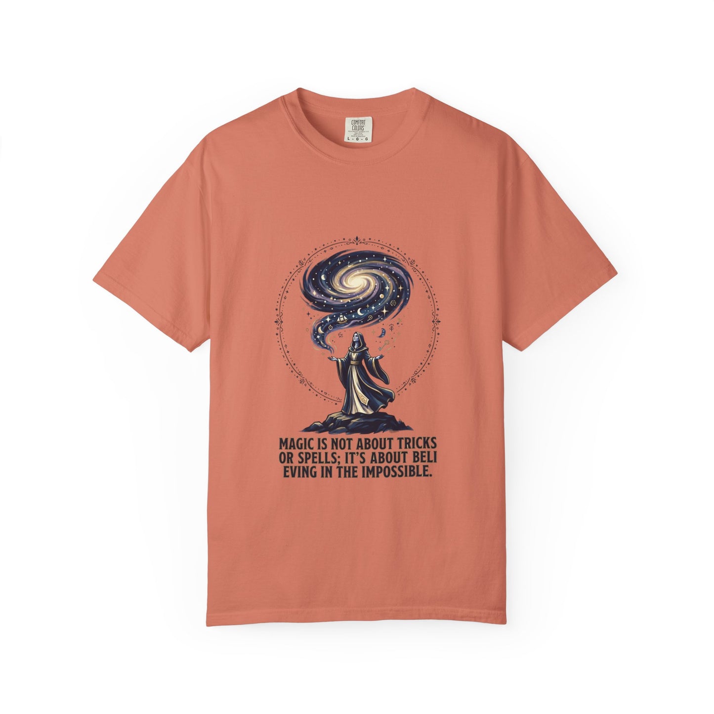 Magic Believe T‑Shirt — Wizard Gazing at Galaxy with "Magic is not about tricks or spells; it's about believing in the impossible" Quote