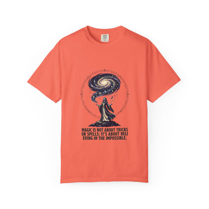 Magic Believe T‑Shirt — Wizard Gazing at Galaxy with "Magic is not about tricks or spells; it's about believing in the impossible" Quote