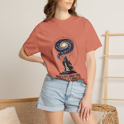 Magic Believe T‑Shirt — Wizard Gazing at Galaxy with "Magic is not about tricks or spells; it's about believing in the impossible" Quote