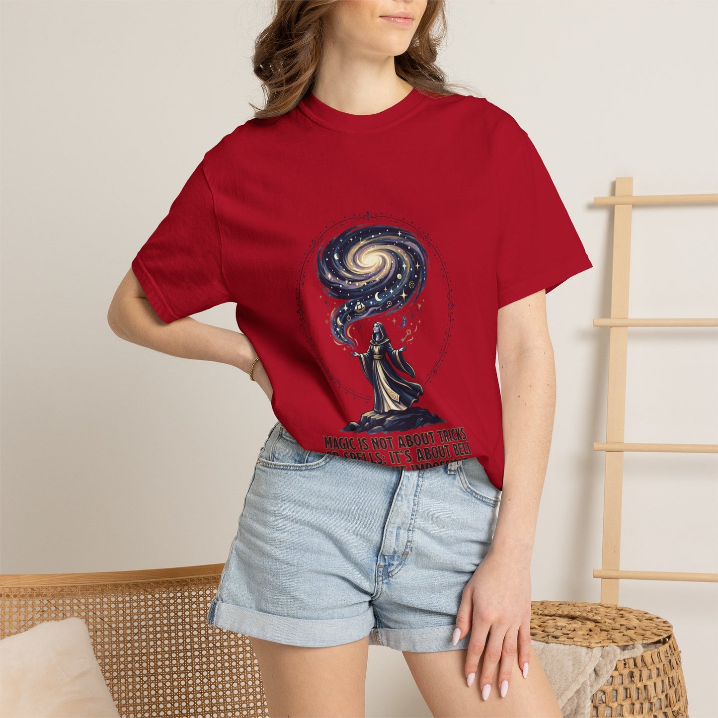 Magic Believe T‑Shirt — Wizard Gazing at Galaxy with "Magic is not about tricks or spells; it's about believing in the impossible" Quote
