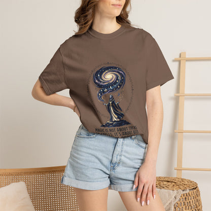 Magic Believe T‑Shirt — Wizard Gazing at Galaxy with "Magic is not about tricks or spells; it's about believing in the impossible" Quote