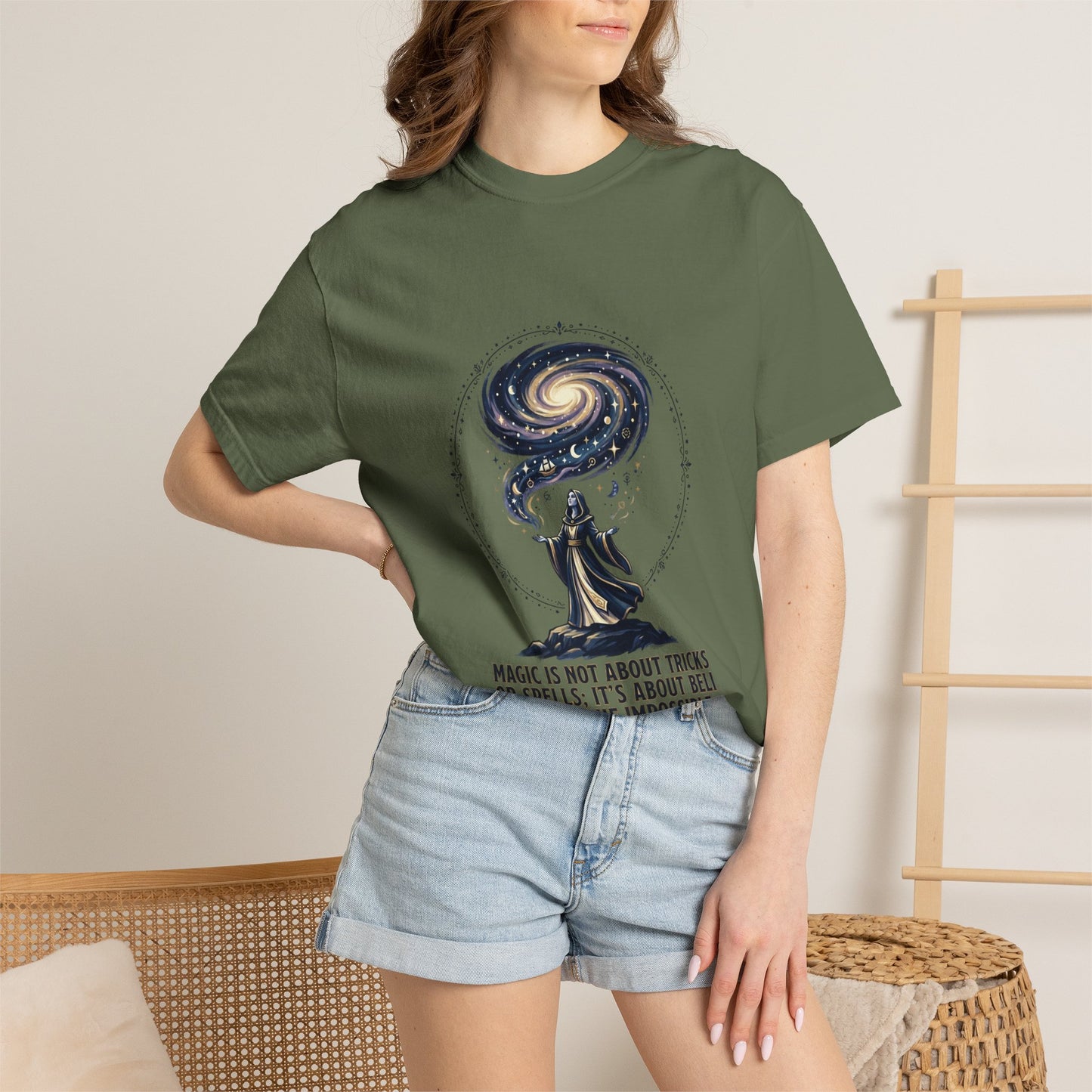 Magic Believe T‑Shirt — Wizard Gazing at Galaxy with "Magic is not about tricks or spells; it's about believing in the impossible" Quote