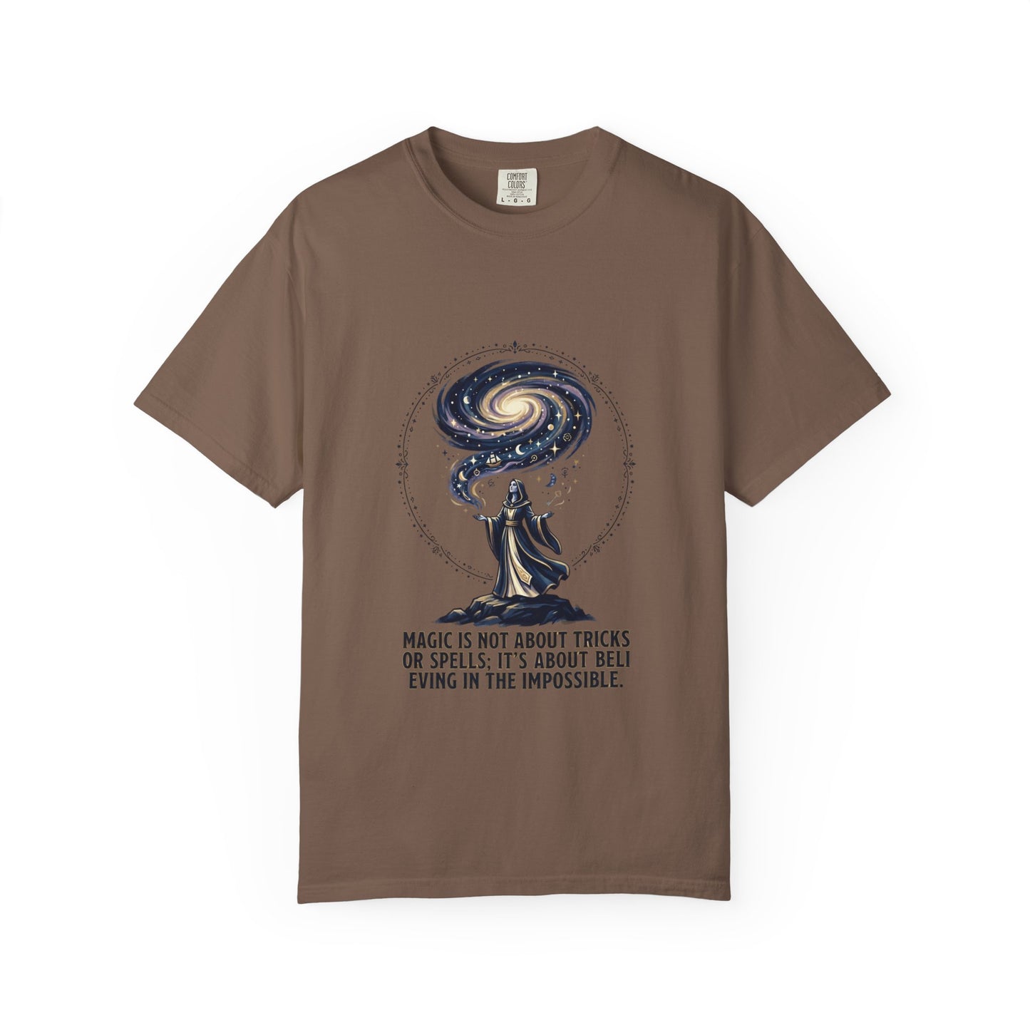 Magic Believe T‑Shirt — Wizard Gazing at Galaxy with "Magic is not about tricks or spells; it's about believing in the impossible" Quote