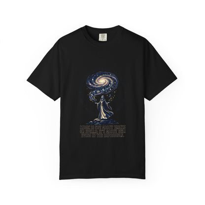 Magic Believe T‑Shirt — Wizard Gazing at Galaxy with "Magic is not about tricks or spells; it's about believing in the impossible" Quote