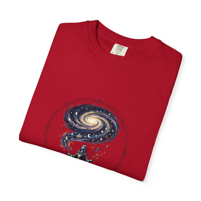 Magic Believe T‑Shirt — Wizard Gazing at Galaxy with "Magic is not about tricks or spells; it's about believing in the impossible" Quote