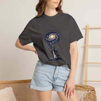 Magic Believe T‑Shirt — Wizard Gazing at Galaxy with "Magic is not about tricks or spells; it's about believing in the impossible" Quote