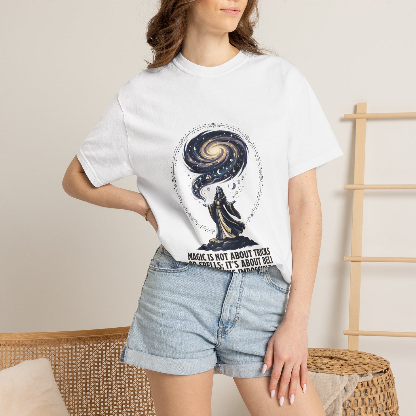 Magic Believe T‑Shirt — Wizard Gazing at Galaxy with "Magic is not about tricks or spells; it's about believing in the impossible" Quote
